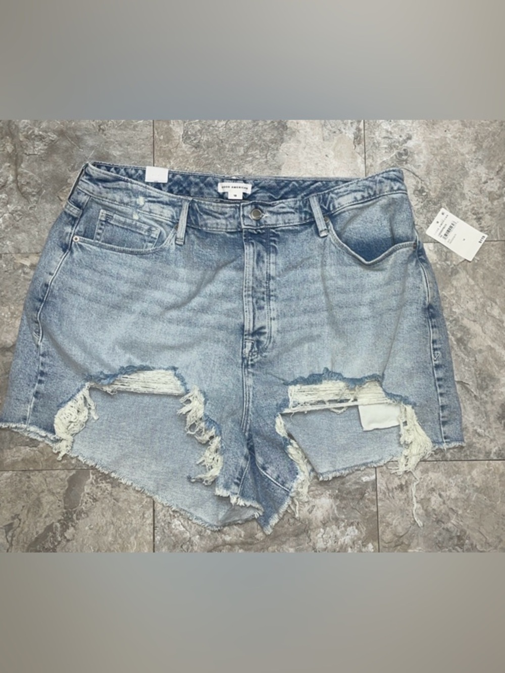 GOOD AMERICAN  NWT size 18 Distressed bombshell Light Wash Denim Cutoff Shorts